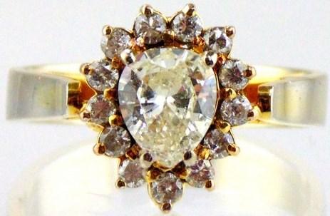Pear shaped diamond 0.73 carat ring in 10kt yellow gold setting