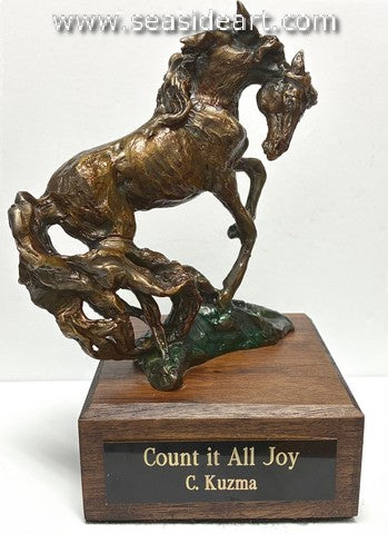 Count It All Joy (1/1) is a bronze sculpture by Cathy Kuzma
