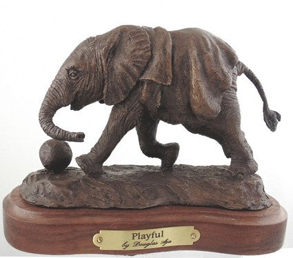 Playful is a bronze sculpture of a baby elephant by Douglas Aja