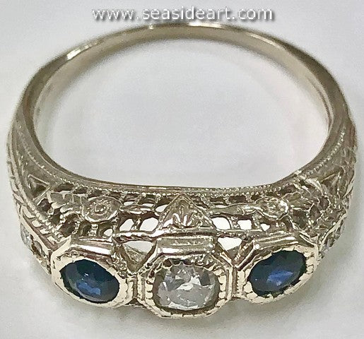 Lady's 14K White Gold Vintage Ring with Diamonds and Sapphire
