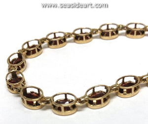 14K Yellow Gold Tennis Style Bracelet with Garnets