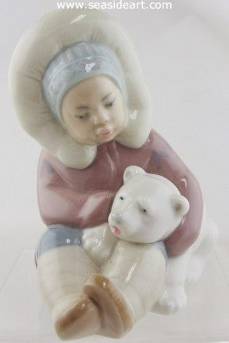 Eskimo Child with A Polar Bear by Lladro - Seaside Art Gallery