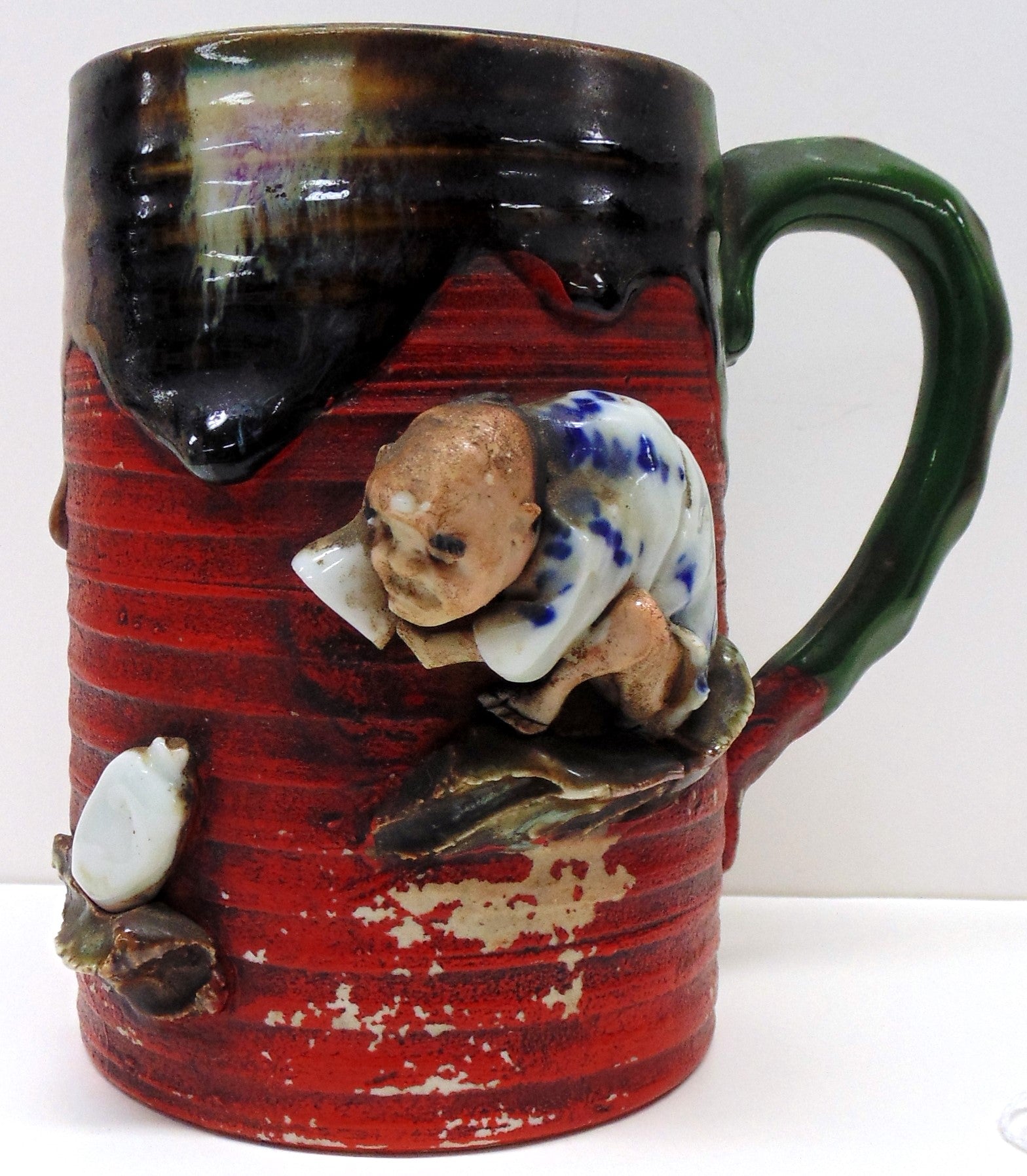19/20TH C Japanese Sumida Gawa Mug-Man with White Bottle