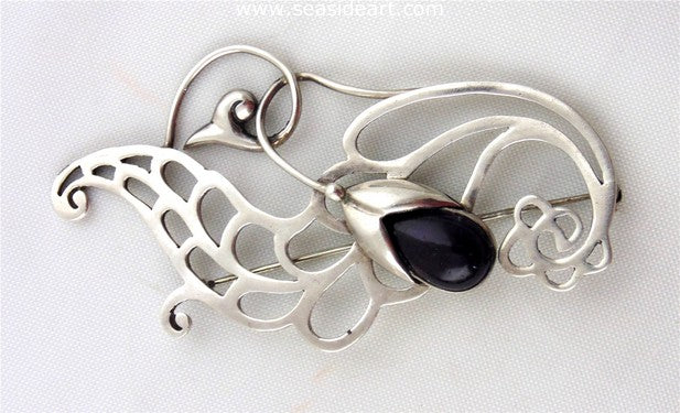 Sterling Silver Floral Brooch with Amethyst by Margot de Taxco